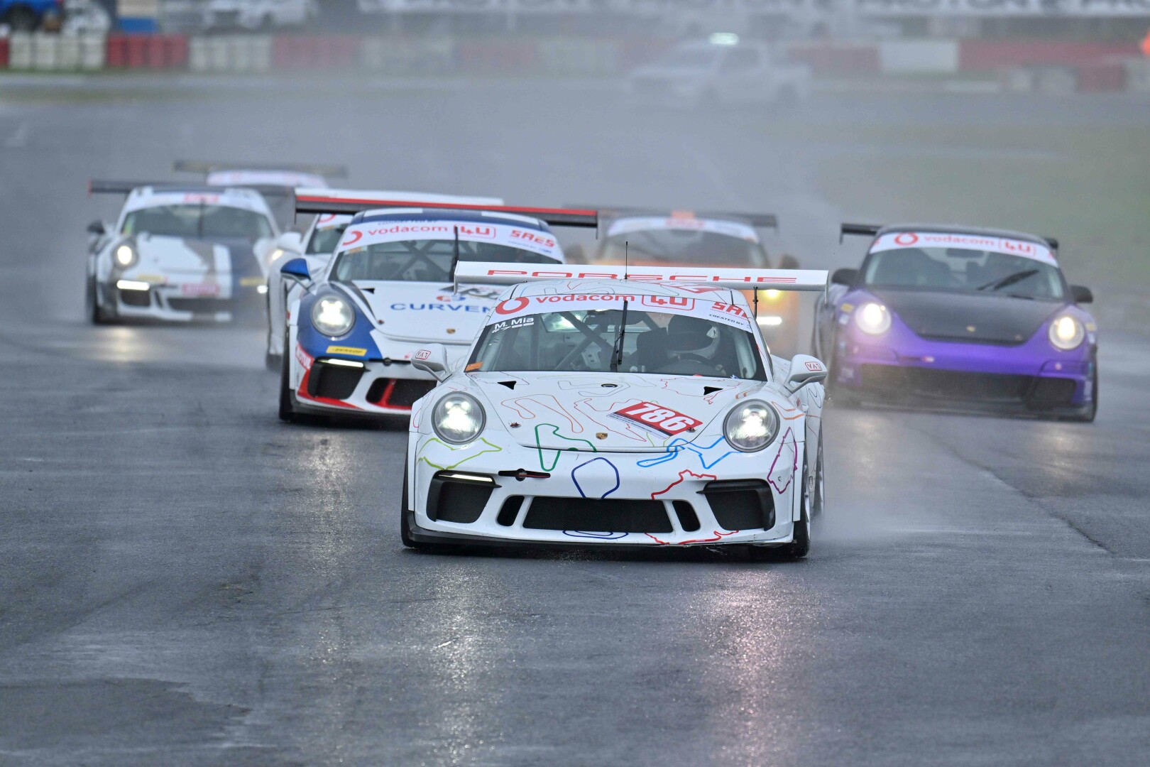 Monsoon conditions test drivers and riders to the limit at Killarney Raceway