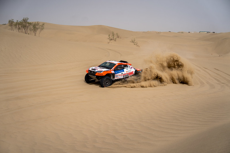 Aliyyah Koloc racing her Red-Lined Revo T1+ car at the 2025 Taklimakan Rally in China 